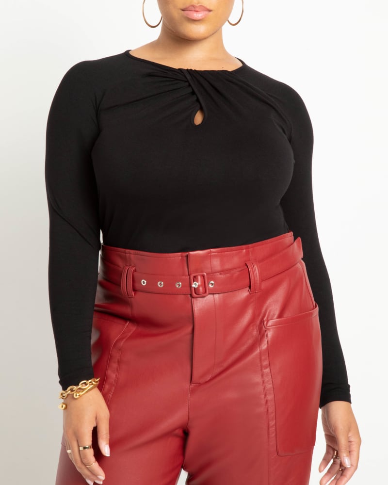Front of a model wearing a size 14/16 Harper Draped Top in Totally Black by ELOQUII. | dia_product_style_image_id:231570
